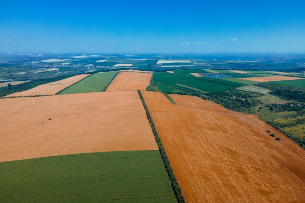 aerial view of agricultural lands with multiple crops