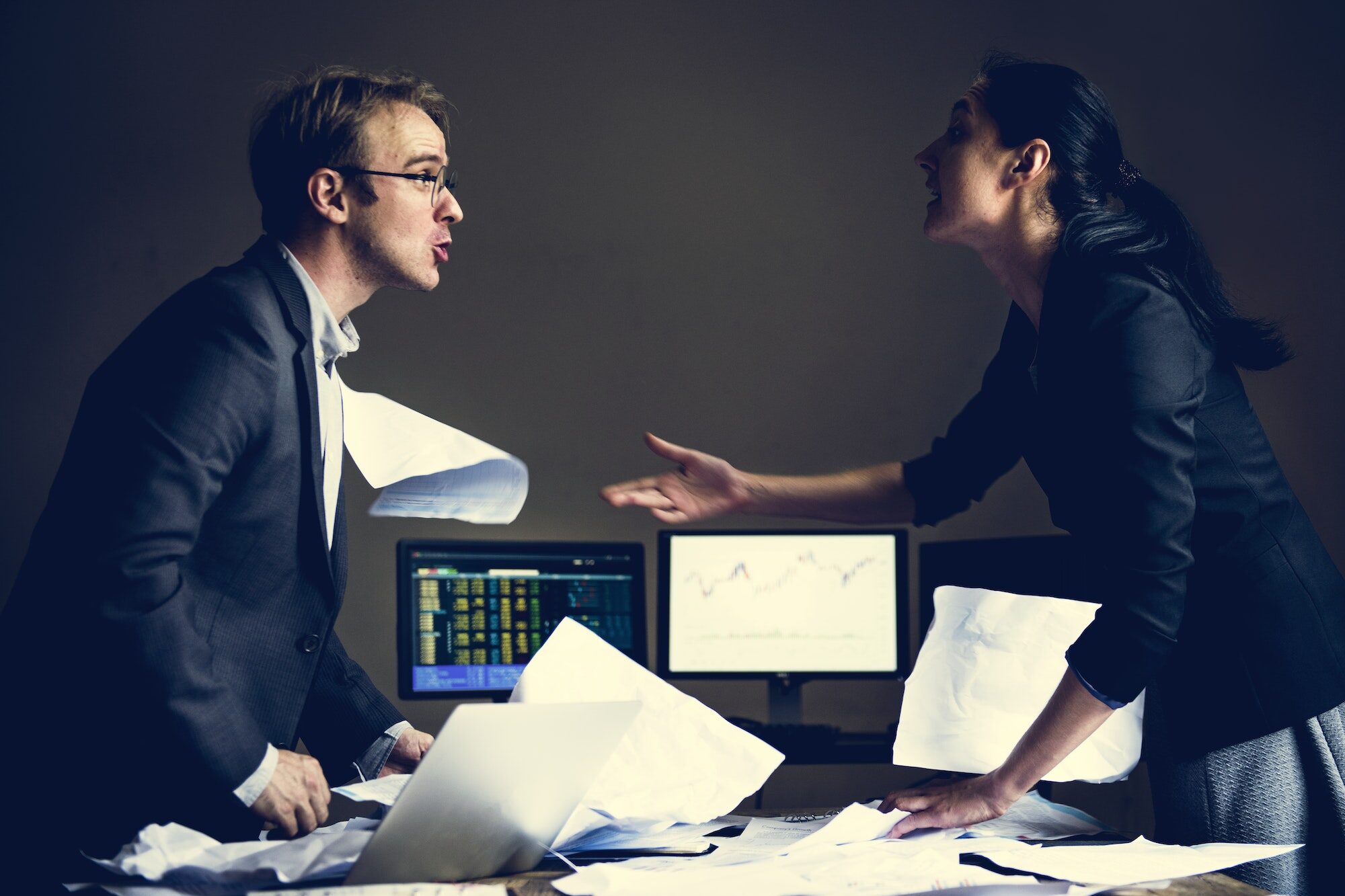 Business partner fighting while they are meeting