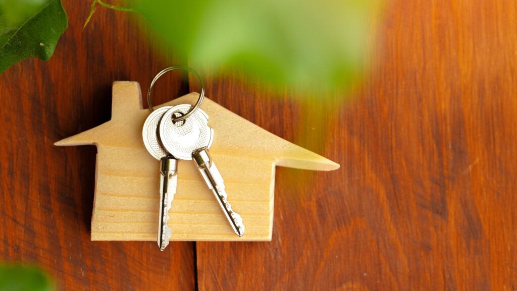 Wooden house model miniature and house keys